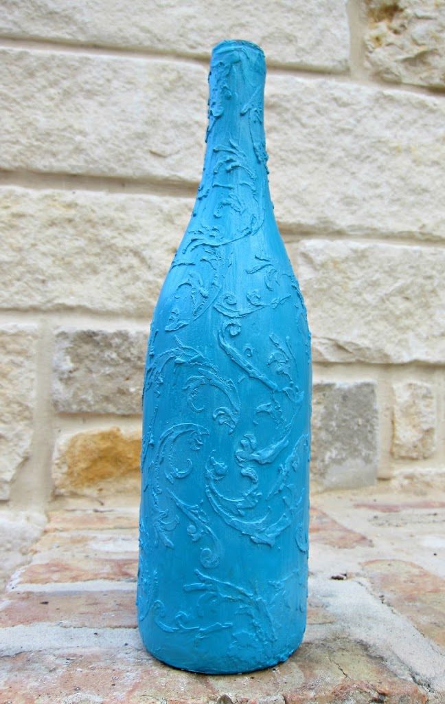 Botella decorada con efecto cerámica