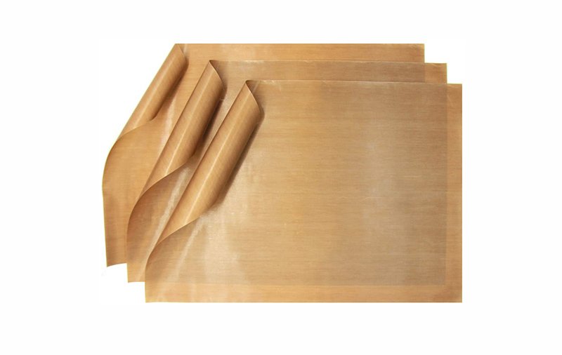Tres láminas de papel de horno reutilizable de teflón de color tostado