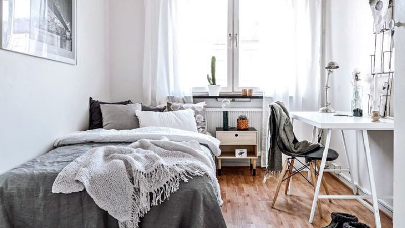 Dormitorio con una paleta de colores clara 